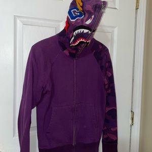 Minor stain by pocket area near zipper